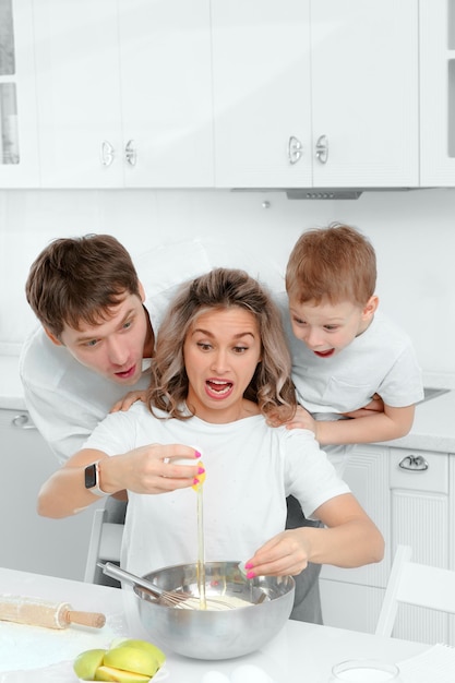 Happy family cooking together